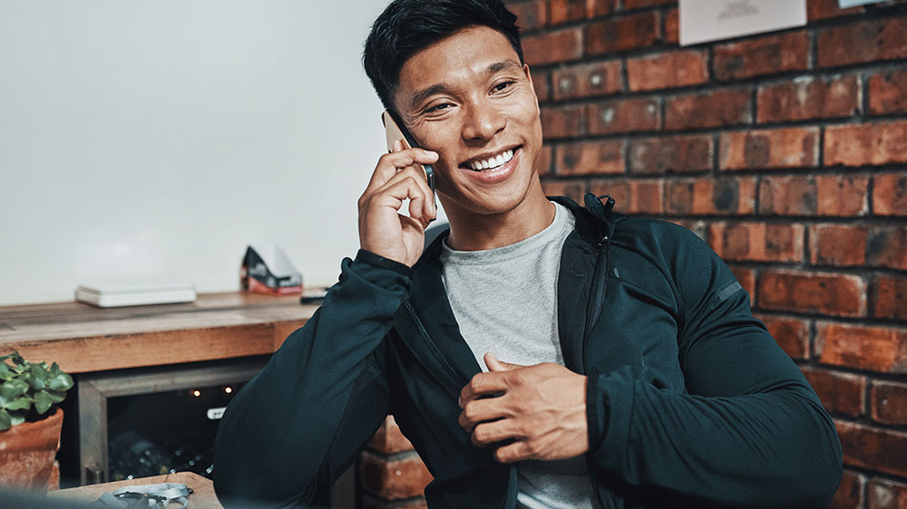 Man on the phone during a telehealth call 