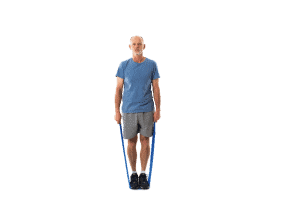man standing with theraband under feet
