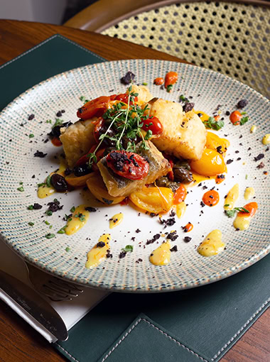 Cod on a plate at the restaurant