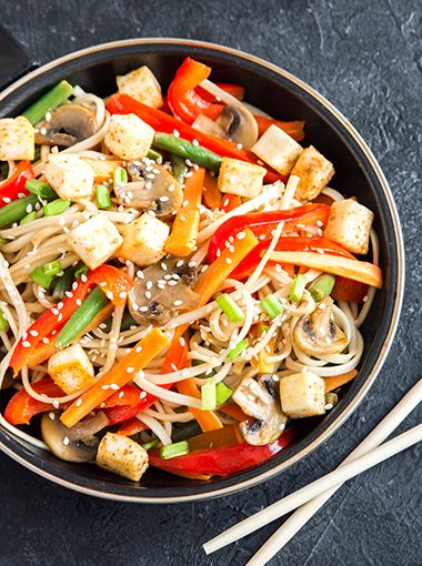 Tofu and salad noodle bowl, ready to be eaten