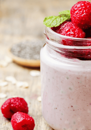 overnight oats with raspberry and mint in a glass jar