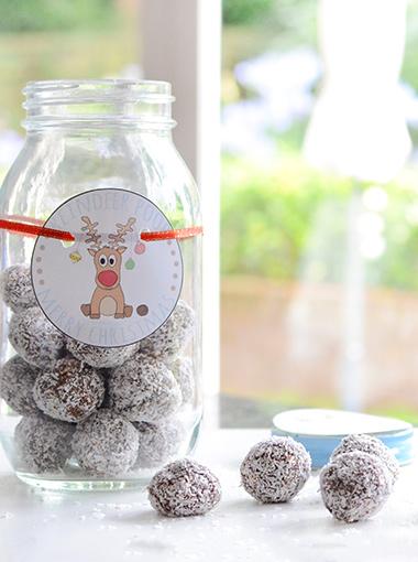 Chocolate and dried fruit bites in a christmas decorated jar