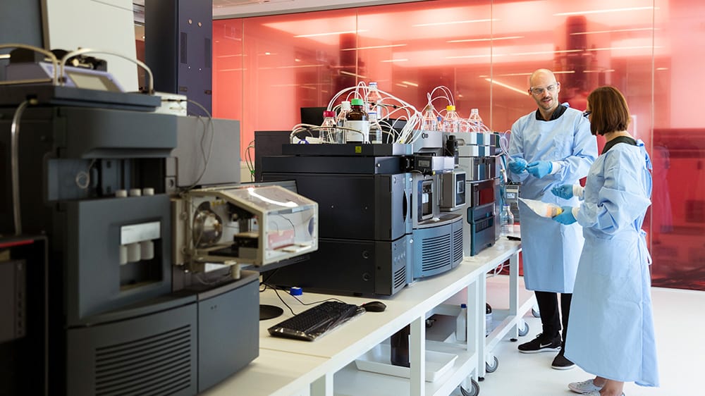 Two scientists in a lab for medical research