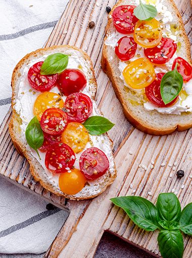 Ricotta and tomato on toast, ready to eat