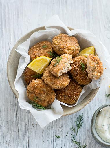 Dill Fishcakes with salmon and white beans garnished with lemon wedges