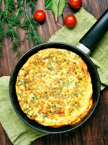 Salmon and vegetable frittata in a pan