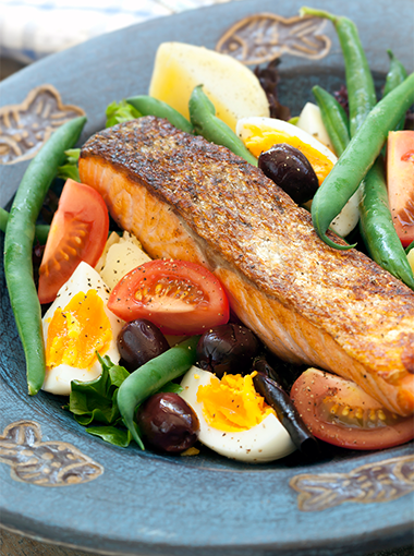 Grilled salmon with salad on a plate