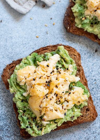 Scrambled eggs and avocado on toast