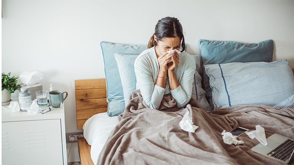 sick woman in bed