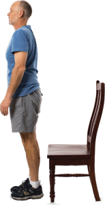 man standing up from chair