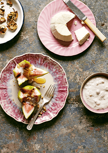 stuffed figs on an old fashioned, pink rimmed plate