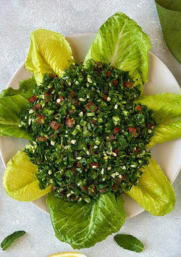 Tabbouleh on lettuce leaves