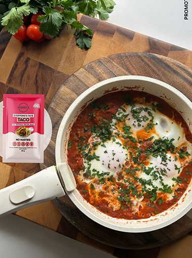 Taco seasoning shakshuka in a pan, with Mingle brand overlay
