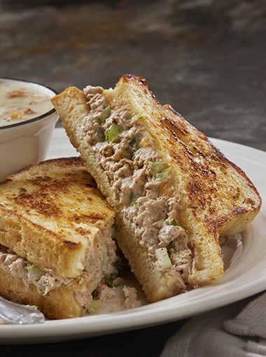 Tuna Spinach and Cheese Melt sandwich on plate