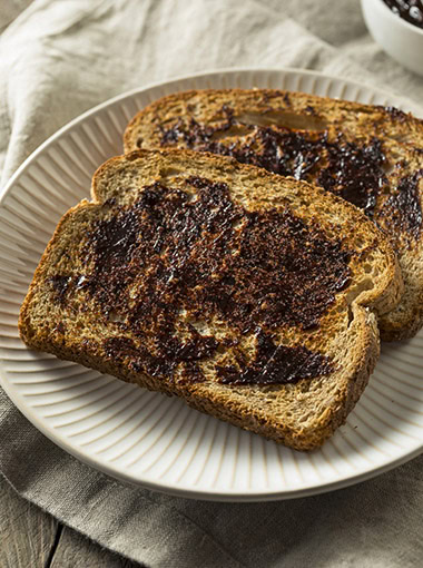 Vegemite on toast on plate