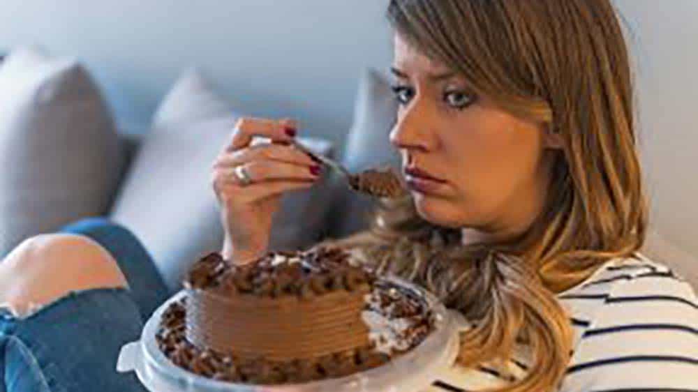 woman eating cake